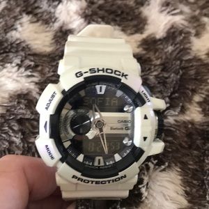 Black and white Mens G-shock watch
